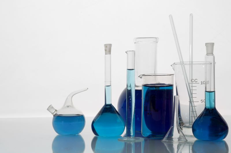 lab-glassware-with-blue-liquid-still-life