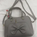 Ladies Grey Plain Leather Sling Bag