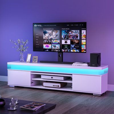 Ivy Bronx Dalia TV Stand For Tvs Up To 65_, Entertainment Center w_ Charging Station & LED Lights brown_Wood in White _ Wayfair